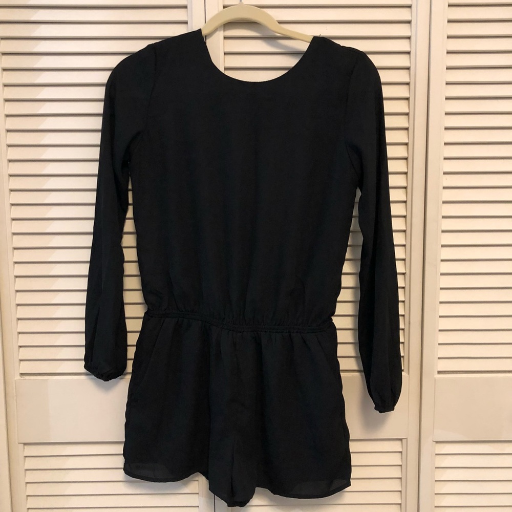Black romper in size XS